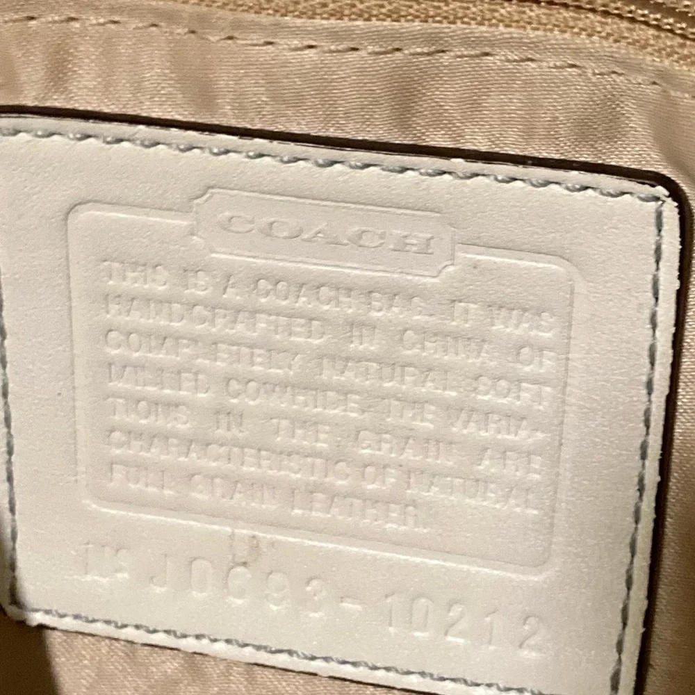 Coach Vintage pebbled white leather tassel bag